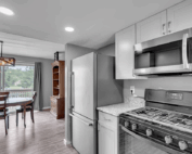 updated amherst townhouse overlooking golf course