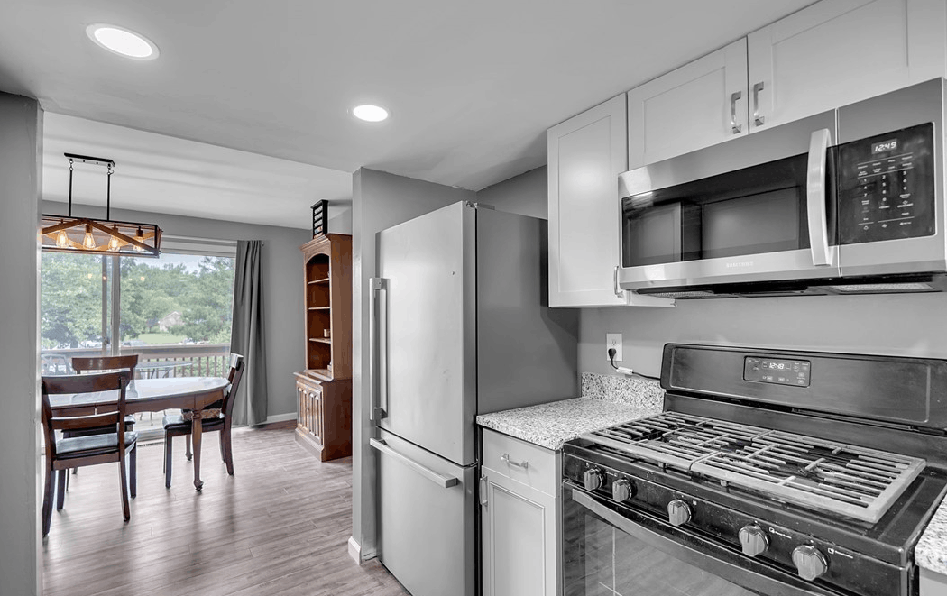 updated amherst townhouse overlooking golf course