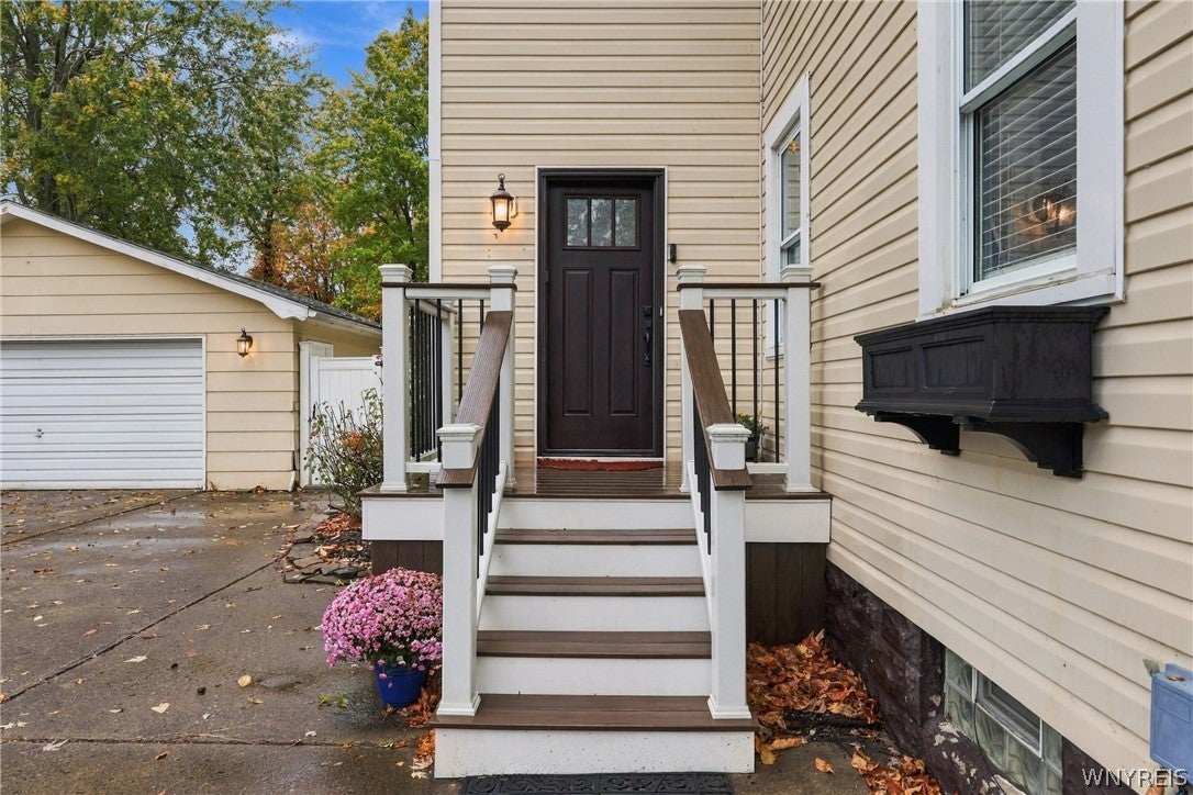 Front steps and entry door at 26 Greenfield Street in Orchard Park NY