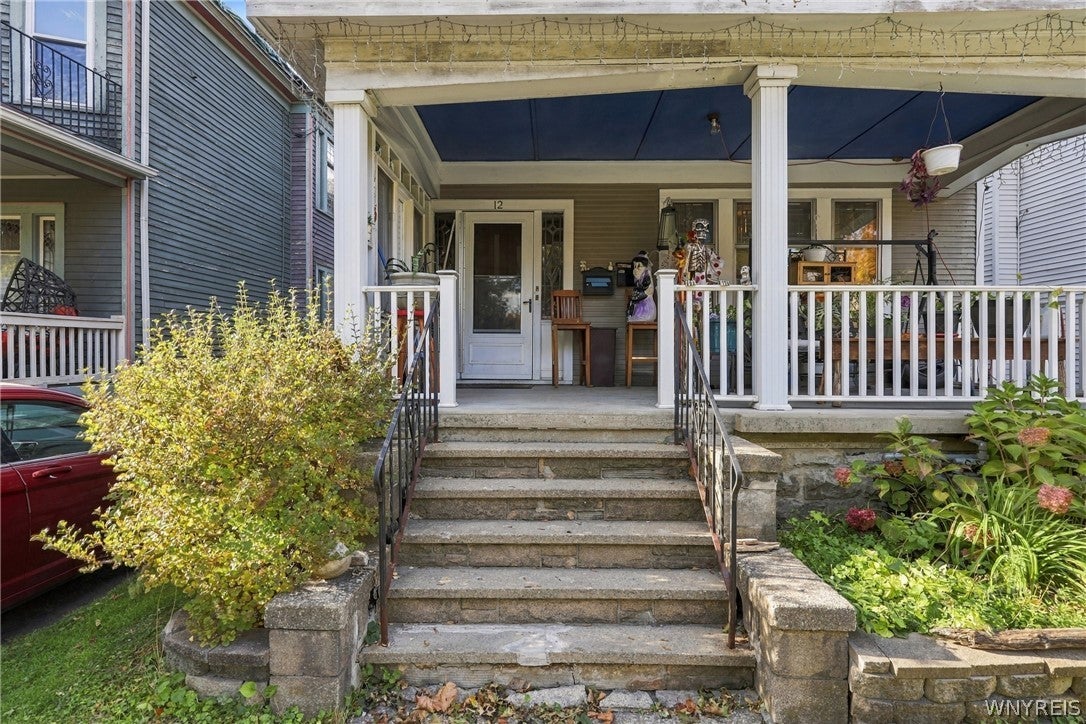 Covered front porch and entry at 12 Cazenovia Street in South Buffalo NY